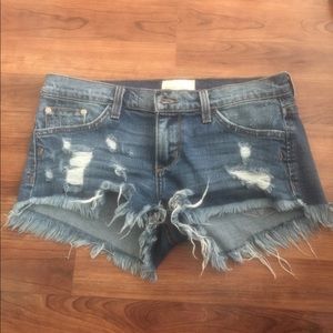 Gilded intent distressed shorts
